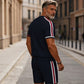 Set de camiseta y pantalones cortos con cremallera cuarta de hombre