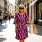 Vestido midi de niveles chic con patrón floral