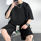 Conjunto de camiseta de manga corta y pantalones cortos de ajuste holgado para hombres